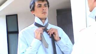 How to tie a tie The Half Windsor [upl. by Marentic]