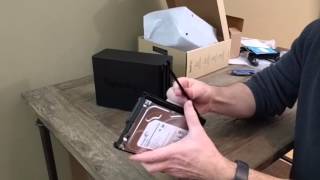 Install a hard drive into the Synology DS216 in 30 Seconds [upl. by Lundgren]