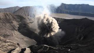 Morning craterrim view of small ash cloud from Bromo volcano [upl. by Narmis]