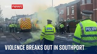 Southport stabbings Police attacked as violence breaks out outside mosque [upl. by Eimarej]