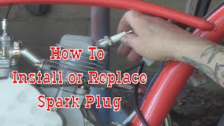 How To Install Or Replace Motorized Bicycle Spark Plug [upl. by Ydnes260]