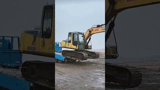 The process of selfunloading an excavator from a truck trailer [upl. by Samira812]