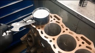 Installing a piston into a cylinder [upl. by Mcfadden]