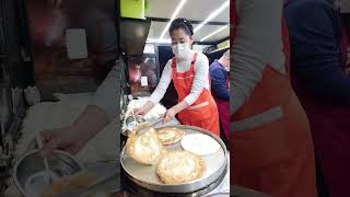 The egg pancakes made on the street look delicious [upl. by Ahteral]