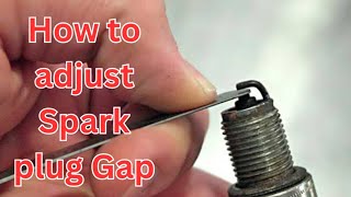 How to adjust spark plug Gap in patrol engine Vehicle [upl. by Edyak778]