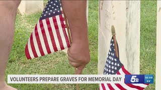 Volunteers prepare gravesites for Memorial Day [upl. by Aymik]