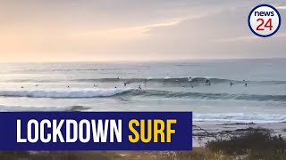 WATCH  Surfers break lockdown regulations in Kommetjie to catch some sunset shade [upl. by Chiles]