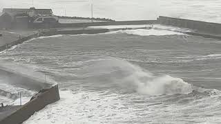 View from Bervie Braes shows boats sheltering from powerful waves behind Stonehaven Harbour wall [upl. by Ainesell]