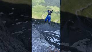 jumping the famous Eiger North Face mountains eiger adrenaline nature switzerland flying sun [upl. by Zebada472]