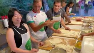 Tossing Pizza dough tutorial in Florence Italy Italian Pizza [upl. by Kingsbury145]