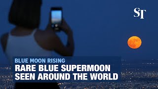 A rare blue supermoon is seen around the world [upl. by Baumbaugh674]