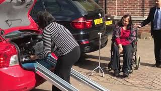 How to get an electric folding wheelchair into a car using ramps  customer demo [upl. by Mareld]