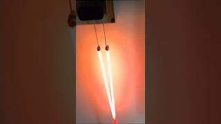 Home burns  nichrome  heating element entertainment heat nichromewire ytshorts experiment [upl. by Eylatan]