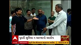 Rajkot News  રાજકોટમાં બિલ્ડર અને રહીશો વચ્ચે ફ્લેટમાં સુવિધા મુદ્દે બબાલ જુઓ અહેવાલ [upl. by Einot744]