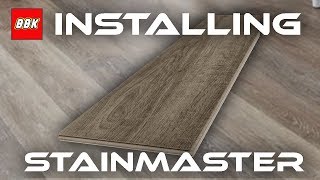 Installing STAINMASTER Washed Oak Locking Luxury Floor and Review  Bathroom Floor [upl. by Abibah]