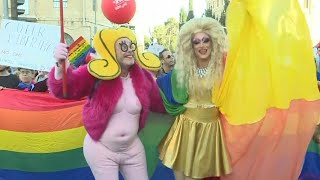 People participate in annual Pride Parade in Jerusalems city centre  AFP [upl. by Dlanigger]