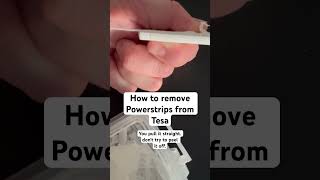 How to remove a Powerstrips by Tesa You pull it straight Dont try to peel it off [upl. by Tse866]