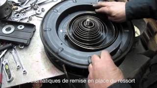 Réparation dun ressort dembobineuse de boyau à airHose reel spring repair [upl. by Parthinia]