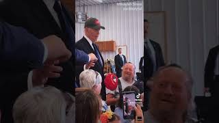 Biden tries on a MAGA Trump hat at event [upl. by Jadwiga313]