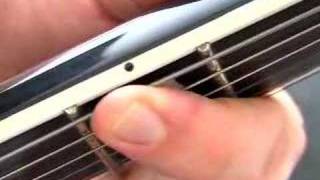 Guitar basics Fretting tips lesson beginner tuition [upl. by Yetak423]