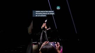 Adele warns fans about throwing items on stage itvnews adele LA weekendswithadele [upl. by Corell608]