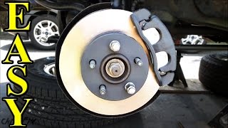 How to Replace Front Brakes Pads and Rotors [upl. by Aneres696]