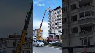 FirstEver Rooftop Excavation Watch How They Did It  excavator rooftop construction engineering [upl. by Bevers]