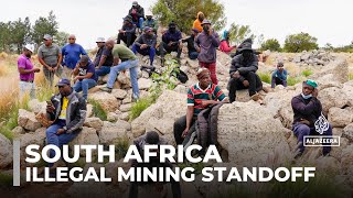 South Africa illegal mining standoff Police plan to remove miners from underground [upl. by Omrellug]