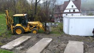 Massey Ferguson 50HX and CAT 416C container liftup [upl. by Oilut]