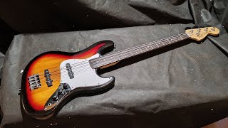 Обзор сборки китайской реплики Fender JazzBass 4 струны санберст гриф палисандр [upl. by Ynattyrb687]