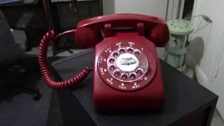 Red rotary telephone  1970s [upl. by Eidob]