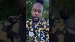 Popcaan outside on his bicycle [upl. by Derf]