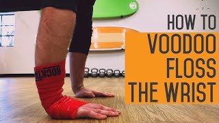 How to Voodoo Floss the Wrist w Dr Baird  Solving Pain With Strength [upl. by Llenral936]