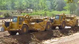 Living on the Edge  CAT Earthmovers excavating a pond  72211wmv [upl. by Earvin]