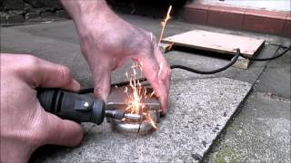 Cutting A Padlock With A Dremel [upl. by Ynogoham528]