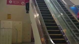 Guy Hangs off Side of Escalator  986053 [upl. by Mamoun]