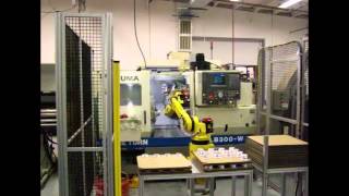 Fanuc M6iB Robot Unloads and Stacks Parts [upl. by Keithley]