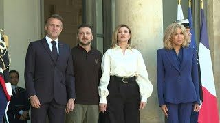 Emmanuel Macron welcomes Volodymyr Zelensky and his wife  AFP [upl. by Adamsen]