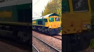 Freightliner class 66 freight train passing Brondesbury station [upl. by Manus116]