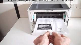 How to fix a printer paper jam [upl. by Pigeon]