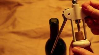 How to Use a Wing  Lever Corkscrew to Open a Wine Bottle [upl. by Amieva290]