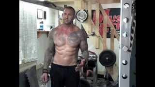 BehindTheBack Dumbbell Shrug by Jim Stoppani [upl. by Sirois308]