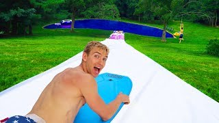 WORLDS BIGGEST BACKYARD WATERSLIDE [upl. by Garcon]