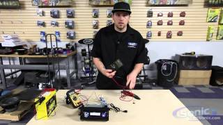 How to Use a Digital Multimeter Checking Voltage  Car Audio 101 [upl. by Helmut970]