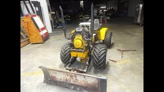 Installing a snow plow on a 3050 Cub Cadet 4 wheel drive [upl. by Idelia381]