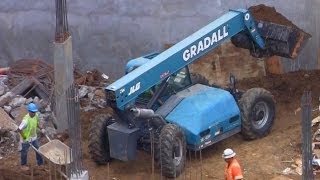 Loaders Move Dirt at Busy Construction Site [upl. by Nordin231]