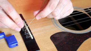 How to Change an Acoustic Guitar String EASY [upl. by Innek]