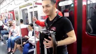 quotDespacitoquot Accordion Player Continues on TTC Train Despite Warning [upl. by Nylecyoj1]