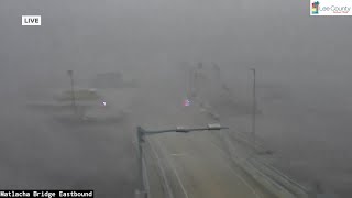 Hurricane Milton Tornado sweeps over bridge during meteorologists live report [upl. by Anayia]