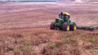 John Deere 7520 pulling John Deere 331 Tandem Disc [upl. by Aisitel599]